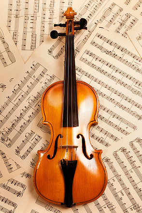 violin with sheet music